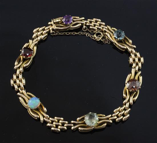 An Edwardian 15ct gold and multi gem set bracelet, approx. 6.75in.